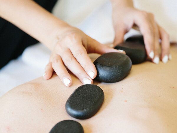 8 Reasons To Try A Hot Stone Massage